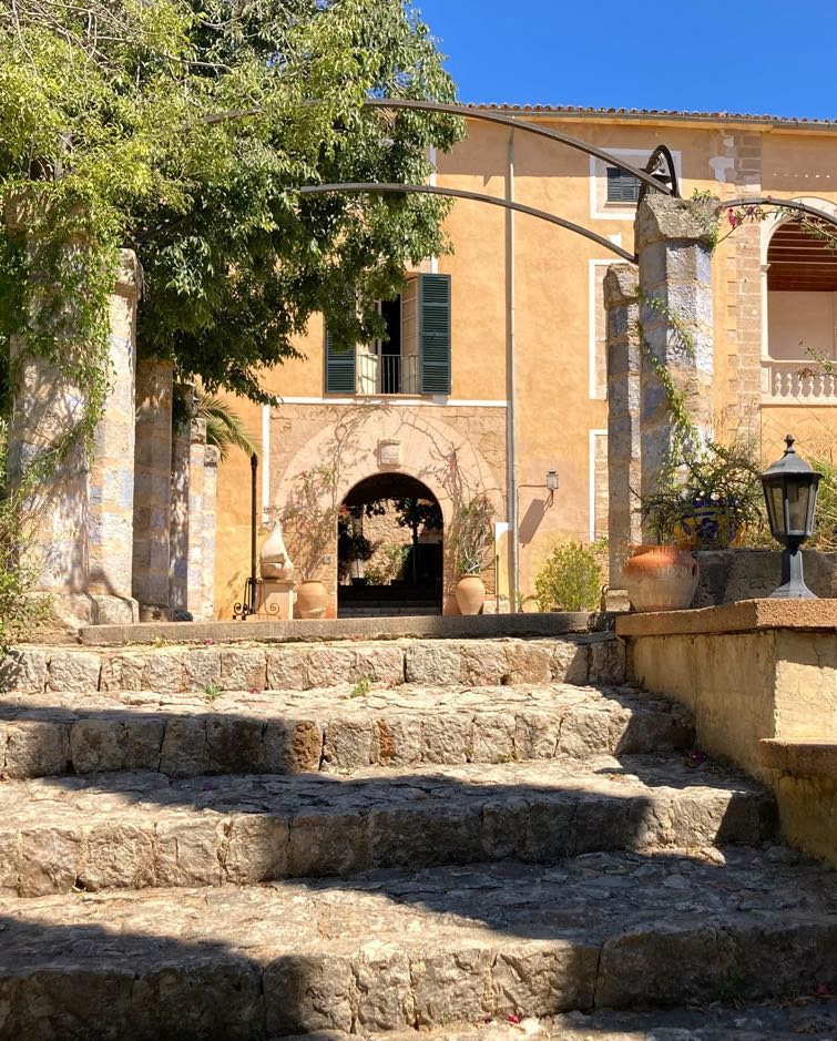 Worn stone steps leading to the main house of a historic possessió on Mallorca